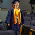 Graduate with honors entering graduation